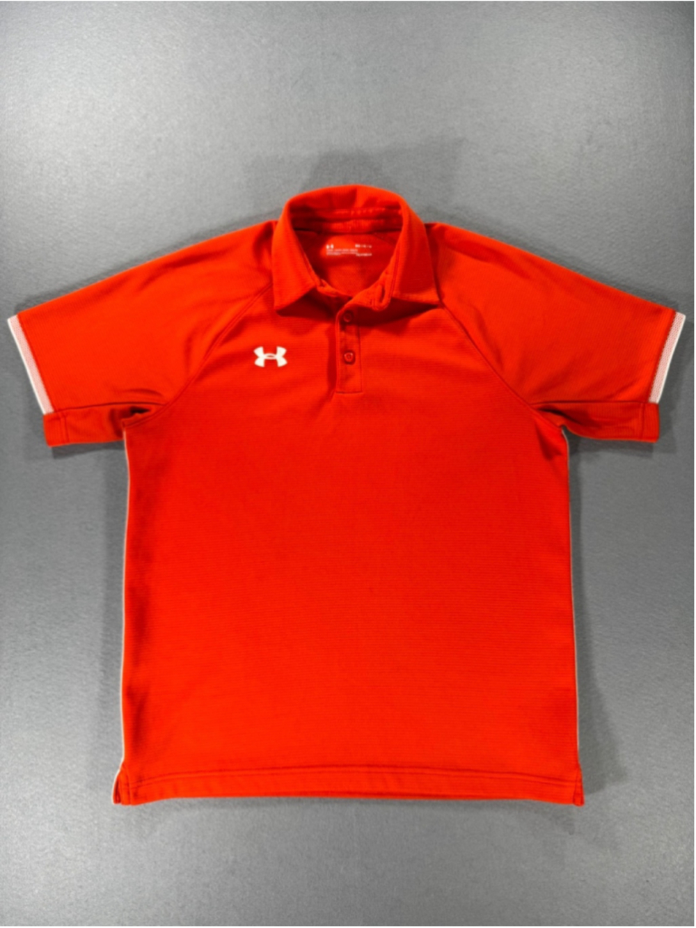 Under Armour Heat Gear Orange Polo With White Accents Down Side Seam and Sleeves